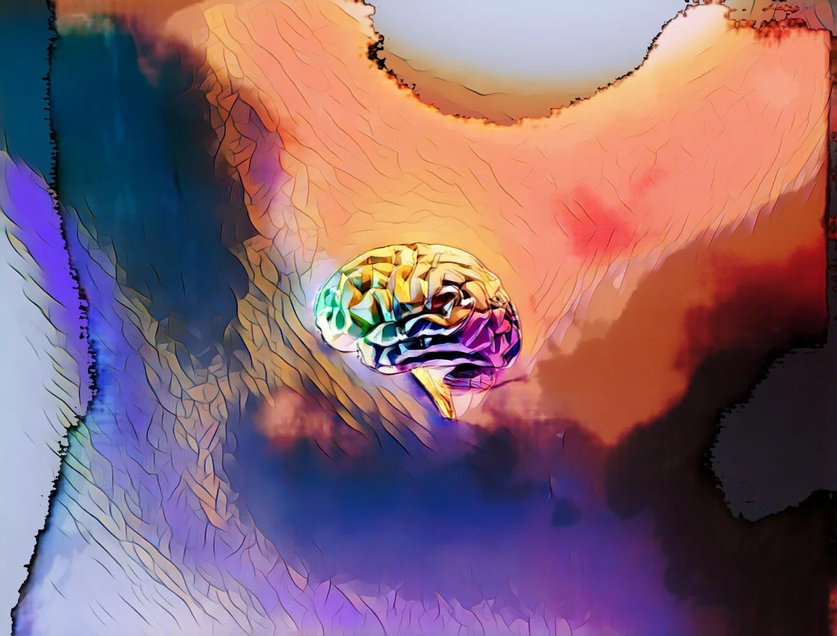 Abstrakte Darstellung eines Gehirns in surrealen Farben und Formen auf einer bunten, strukturierten Hintergrundfläche.