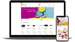 Website-Design auf Laptop und Smartphone mit buntem Geschirr, Pfannen, nudeln und Marmeladen im Onlineshop.