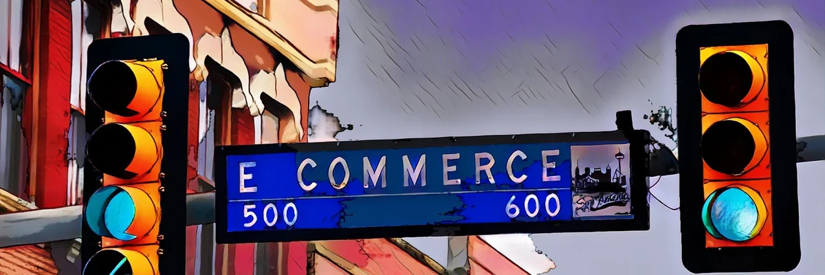 Straßenschild mit der Aufschrift "E Commerce" und Leuchtsignalen vor städtischer Architektur im Hintergrund.